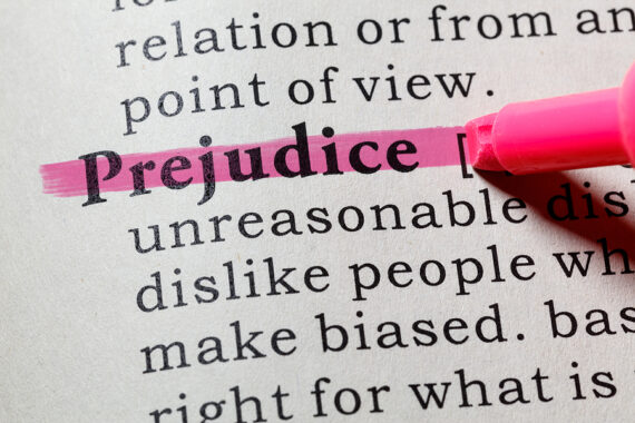 photo of dictionary explanation of word 'prejudice'